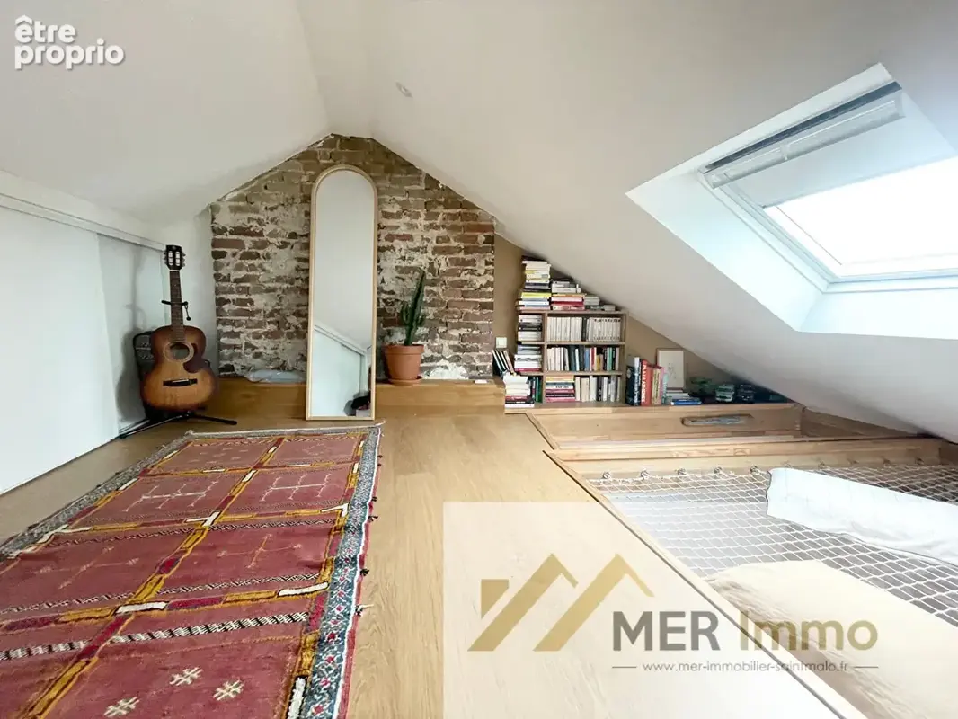 SAINT-MALO PARAMÉ CENTRE- Charmant Appartement T2 en duplex rénové avec goût en plein coeur de Paramé - photo 9