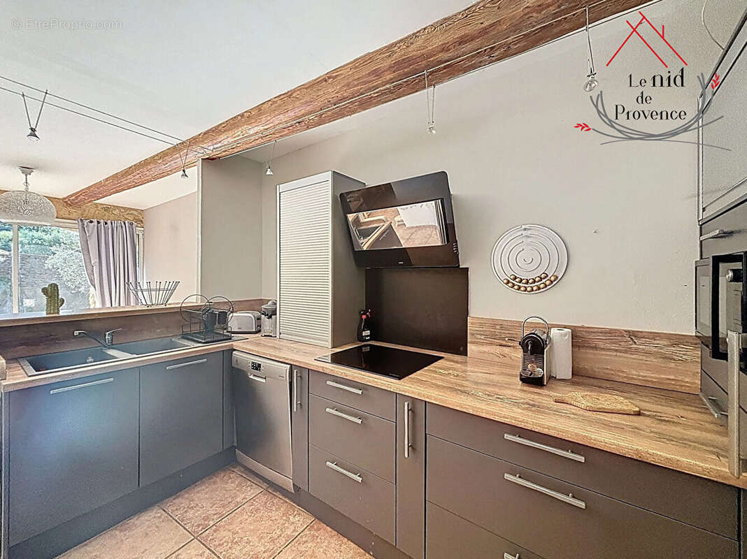 Maison à LAUDUN-L'ARDOISE