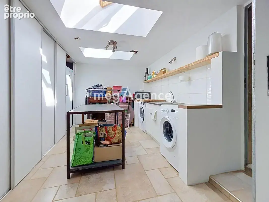 Maison de plain-pied – 148 m² – Grands volumes et vue sur le château - photo 11
