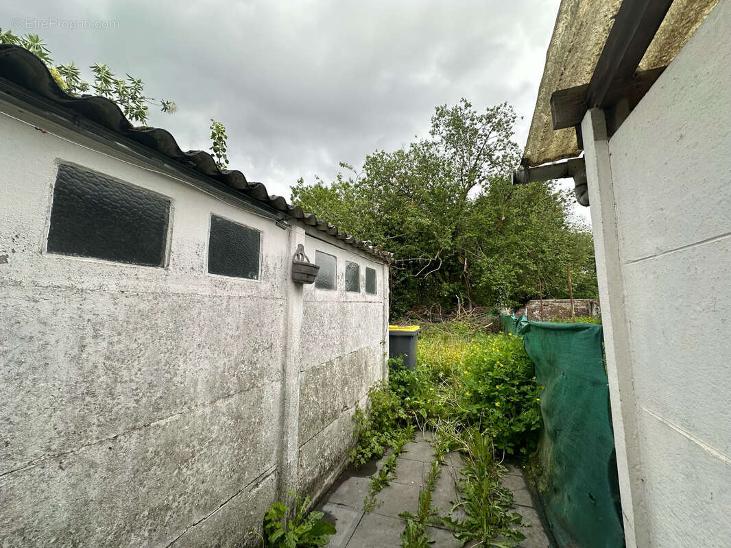 Maison à QUIEVRECHAIN