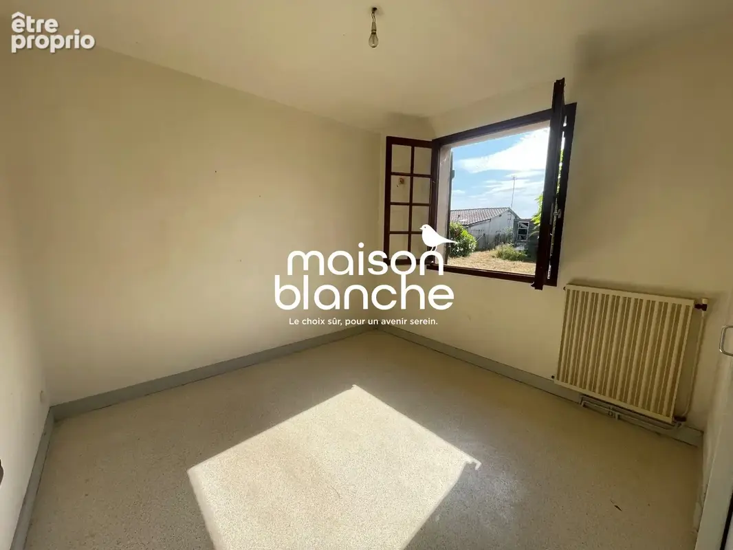 Maison 4 pièces 86 m² à vendre à Coutras (33230) - photo 4
