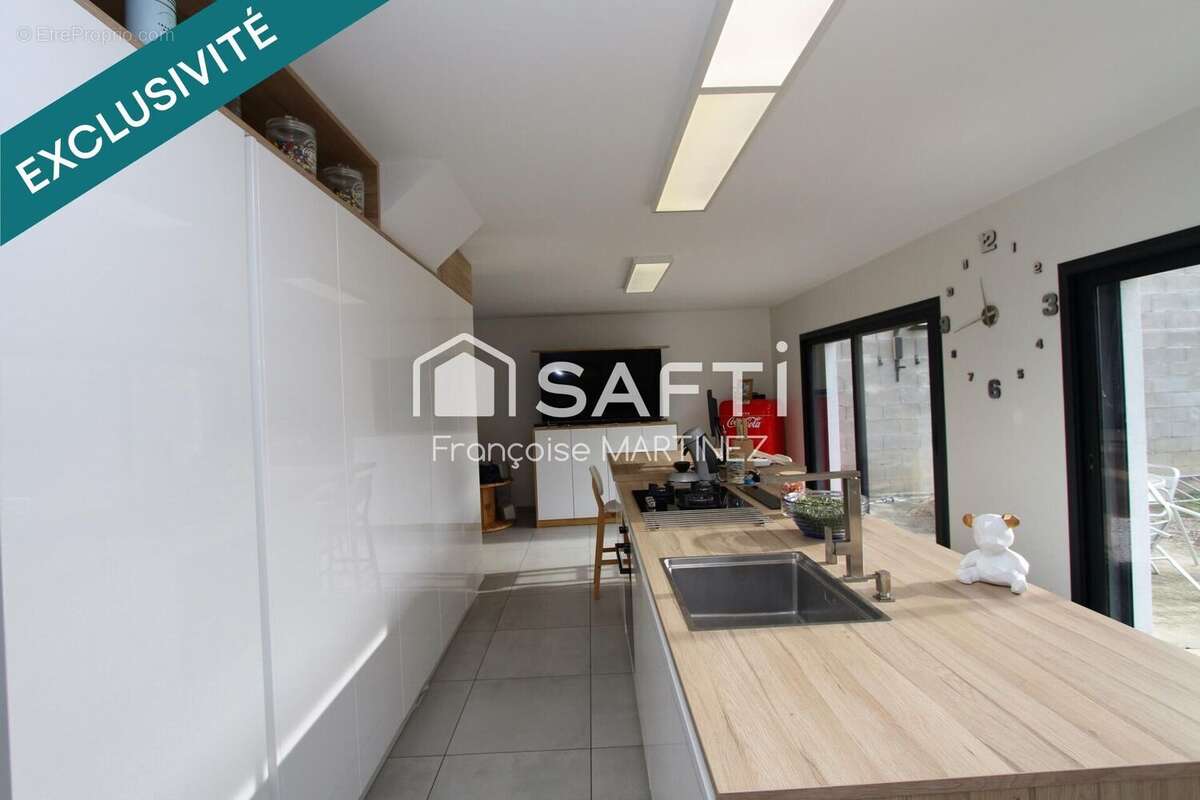 Photo 2 - Maison à BRIGNAIS