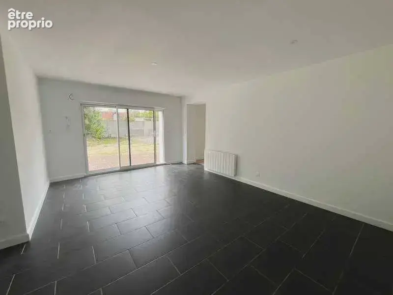Maison 5 pièces 97 m² à vendre à Etrepagny (27150) - photo 4