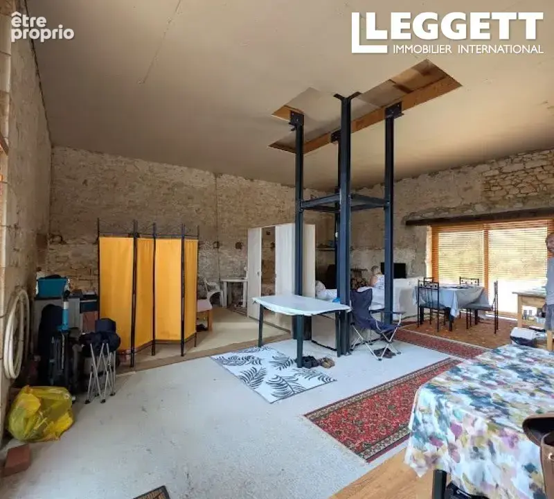 Maison en pierre de 70 m² avec combles aménageables – beau potentiel - photo 6