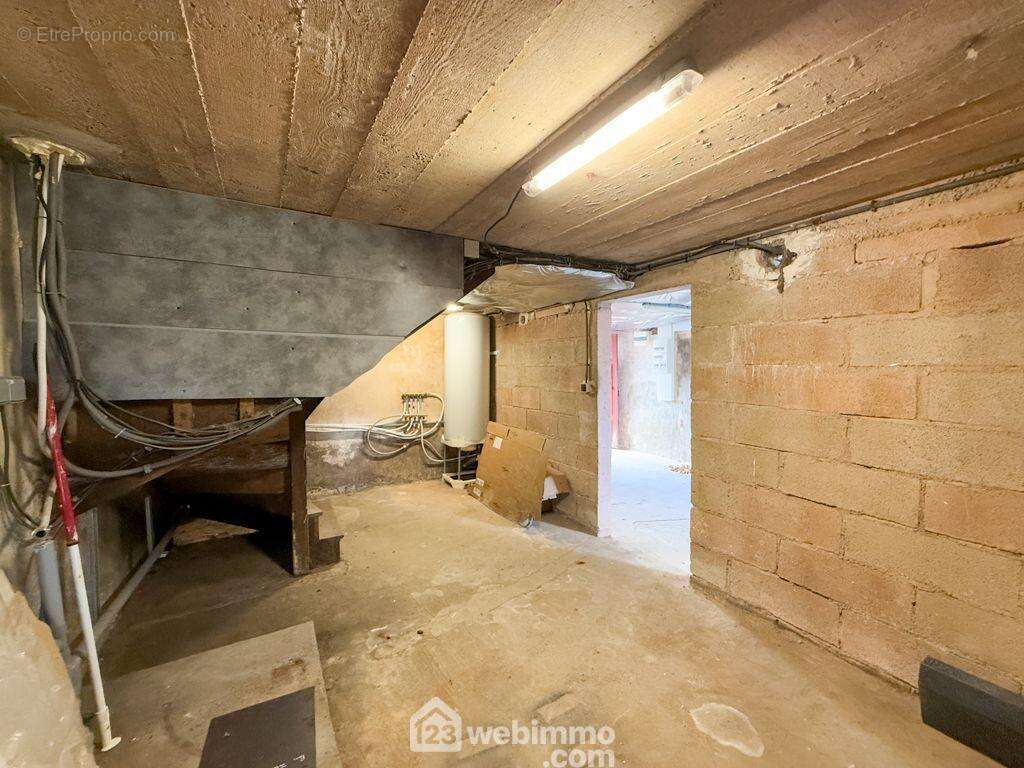 et espace chaufferie. - Maison à LA CHATAIGNERAIE