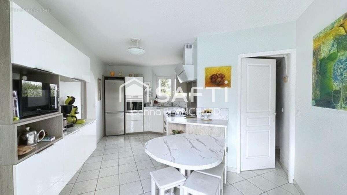 Photo 6 - Maison à LE HAILLAN