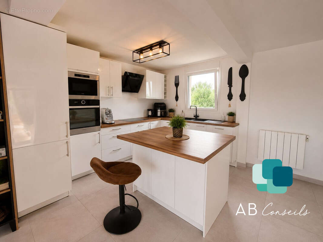 Maison 119 m² à Isneauville  - photo 4