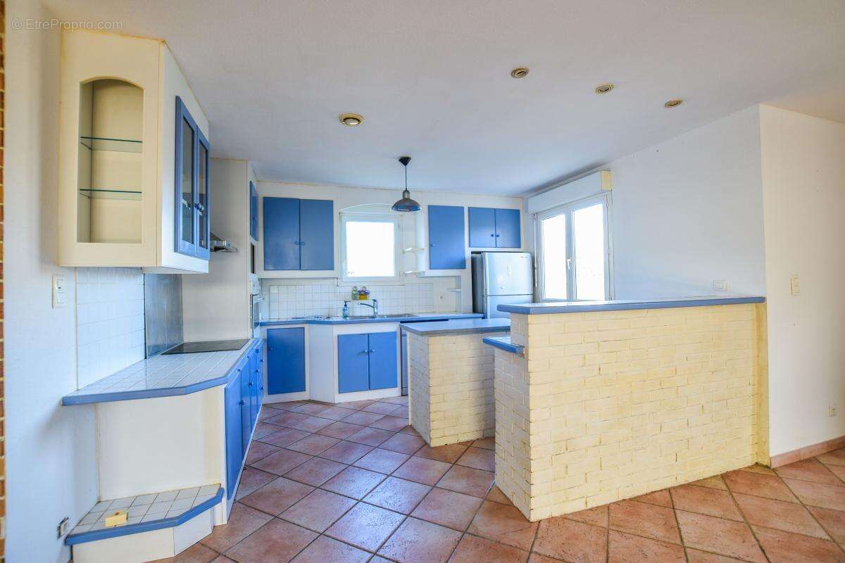 Maison à LAUDUN-L&#039;ARDOISE