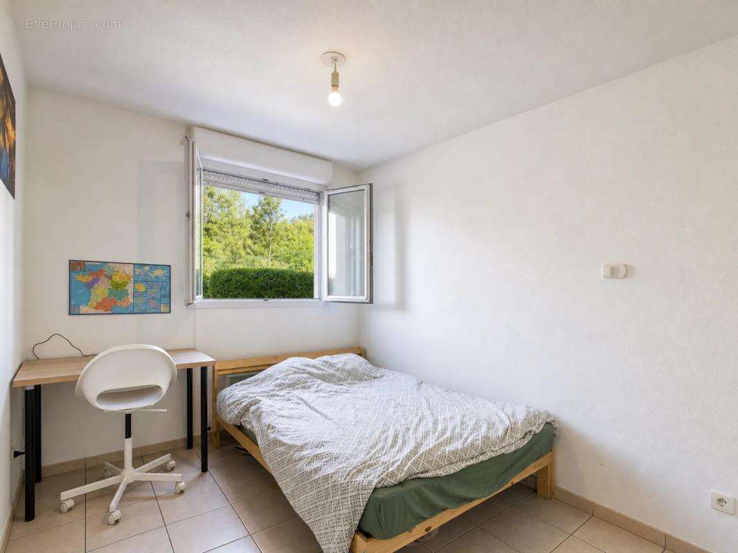T3 avec terrasse et parking – Investissement locatif sécurisé à - photo 5