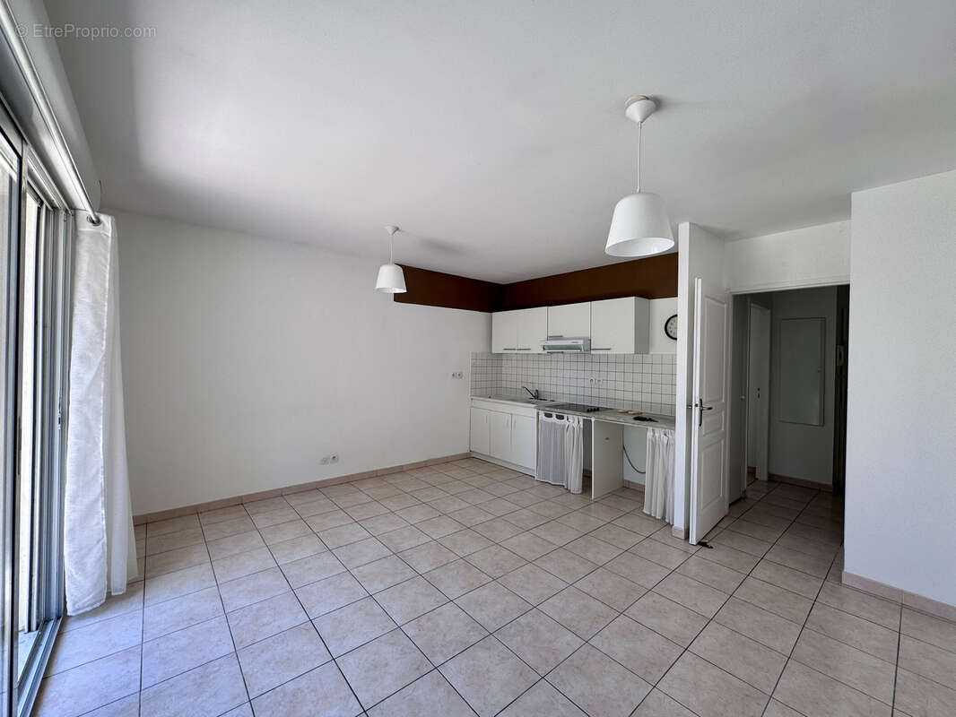 Appartement récent en rez-de-jardin - photo 2