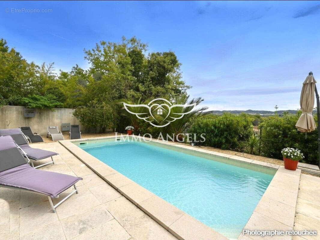 Maison à LAUDUN-L&#039;ARDOISE