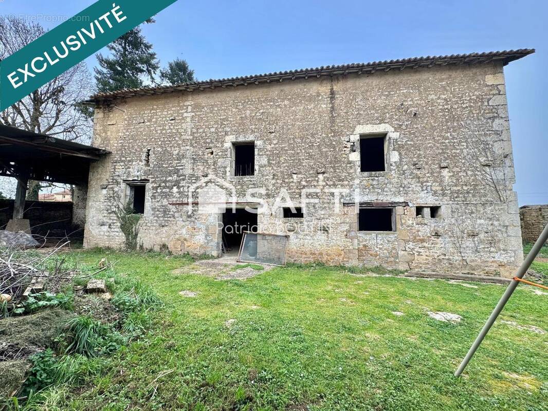 Photo 1 - Maison à MELLE