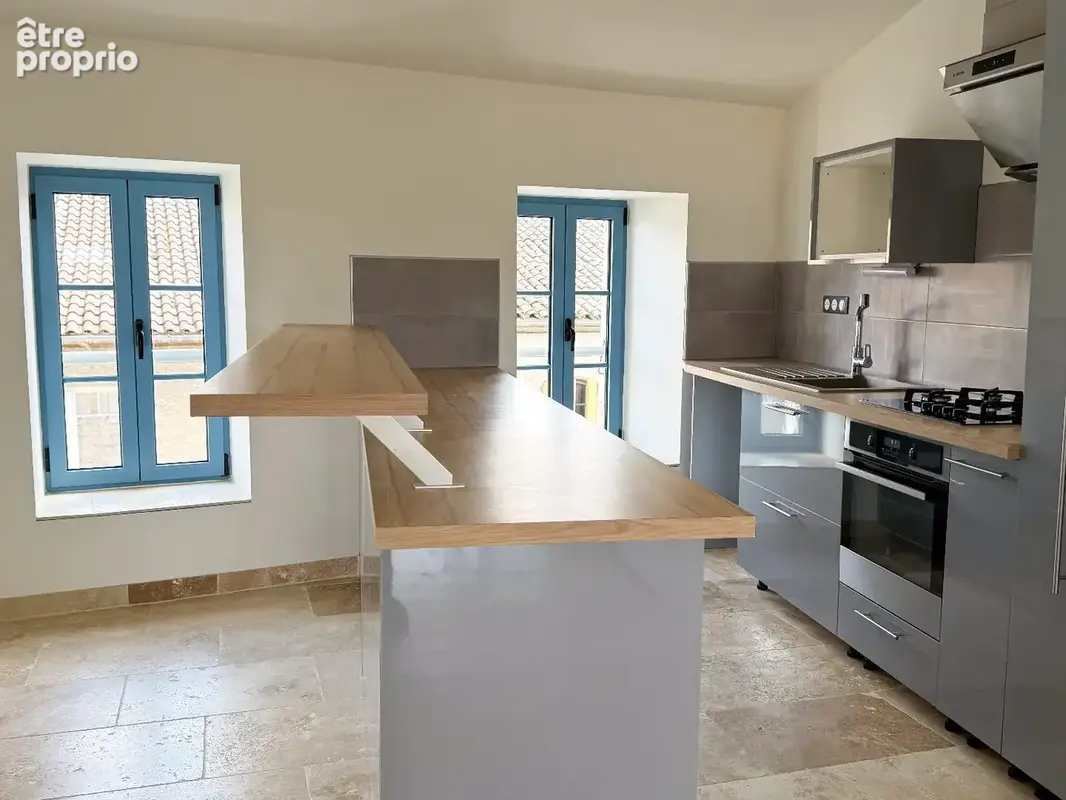 Une rénovation contemporaine pour deux maisons reliées par un patio et jardin avec piscine - photo 21