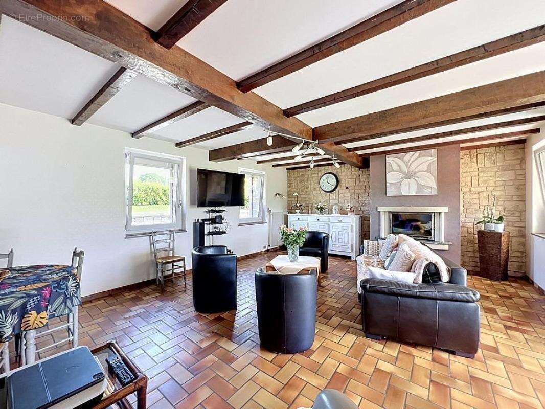 Maison à JUVIGNY-LE-TERTRE