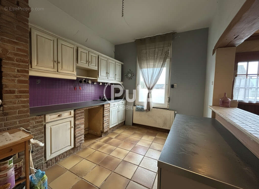 Maison à CALONNE-SUR-LA-LYS