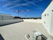 Appartement à BEAUZELLE