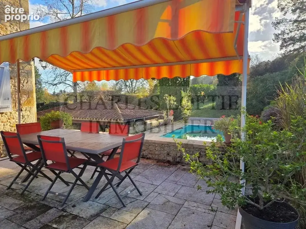 Elegante maison en pierre à Prayssac avec piscine sur terrain de 4400 m2 - photo 11