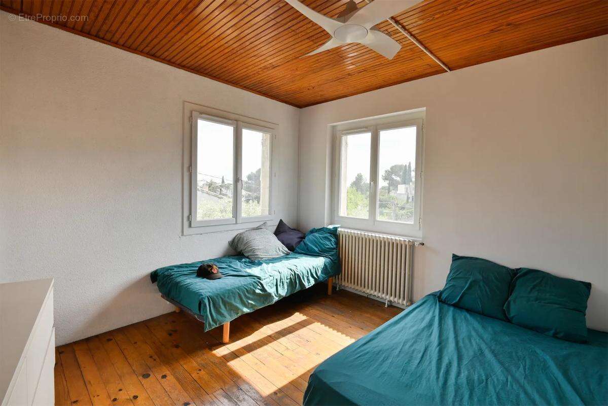 Maison de 6 pièces de 134 m² à Nîmes, Justices Vieilles - photo 11