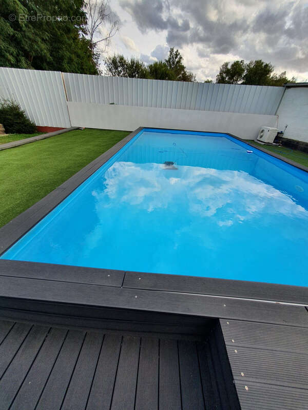 Maison 5 pièces de 130 m2 avec piscine et sous-sol - photo 4