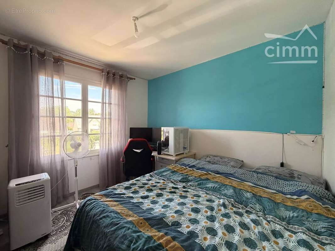 MER – Maison sur sous-sol complet de 130 m² – 4 chambres – Terrain de 970 m² avec vue dégagée sur les champs - photo 8