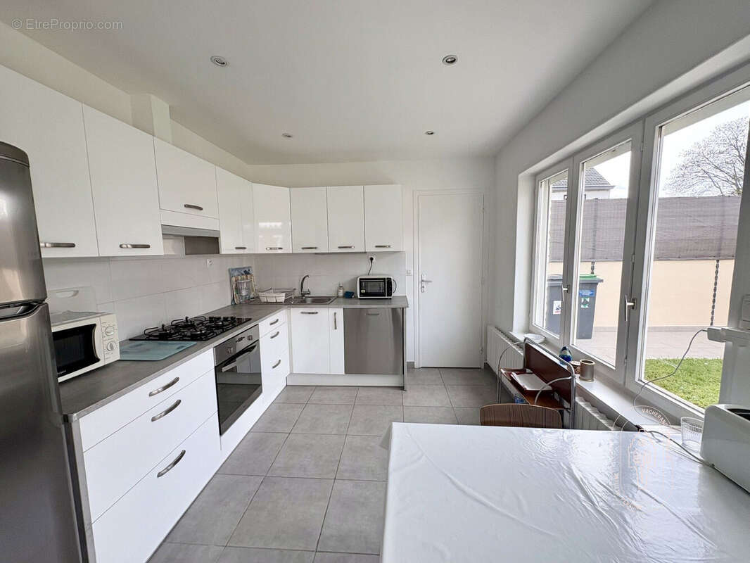 Maison 111 m² à Marcq-En-Baroeul  - photo 6