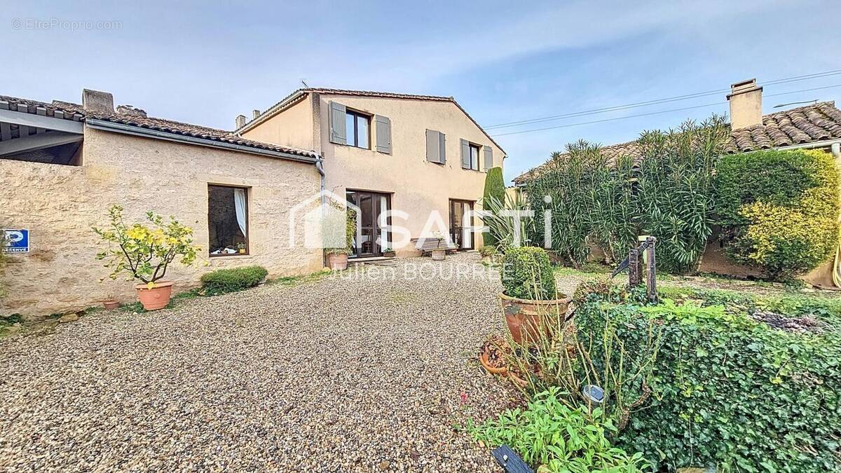 Photo 1 - Commerce à LANGON