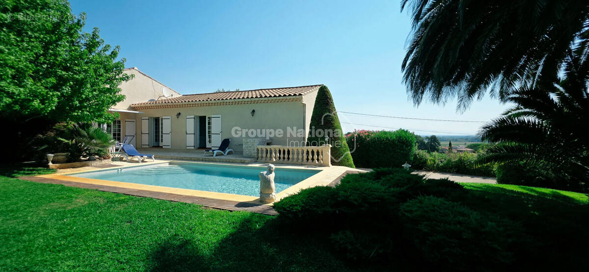Maison à LAUDUN-L'ARDOISE
