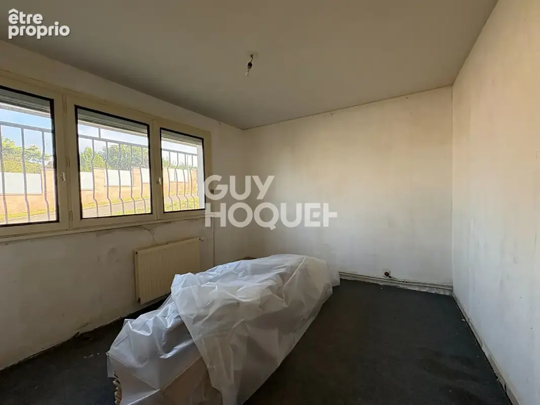 Spacieux T5 à rénover de 105,51 m² avec balcons et cave - photo 9