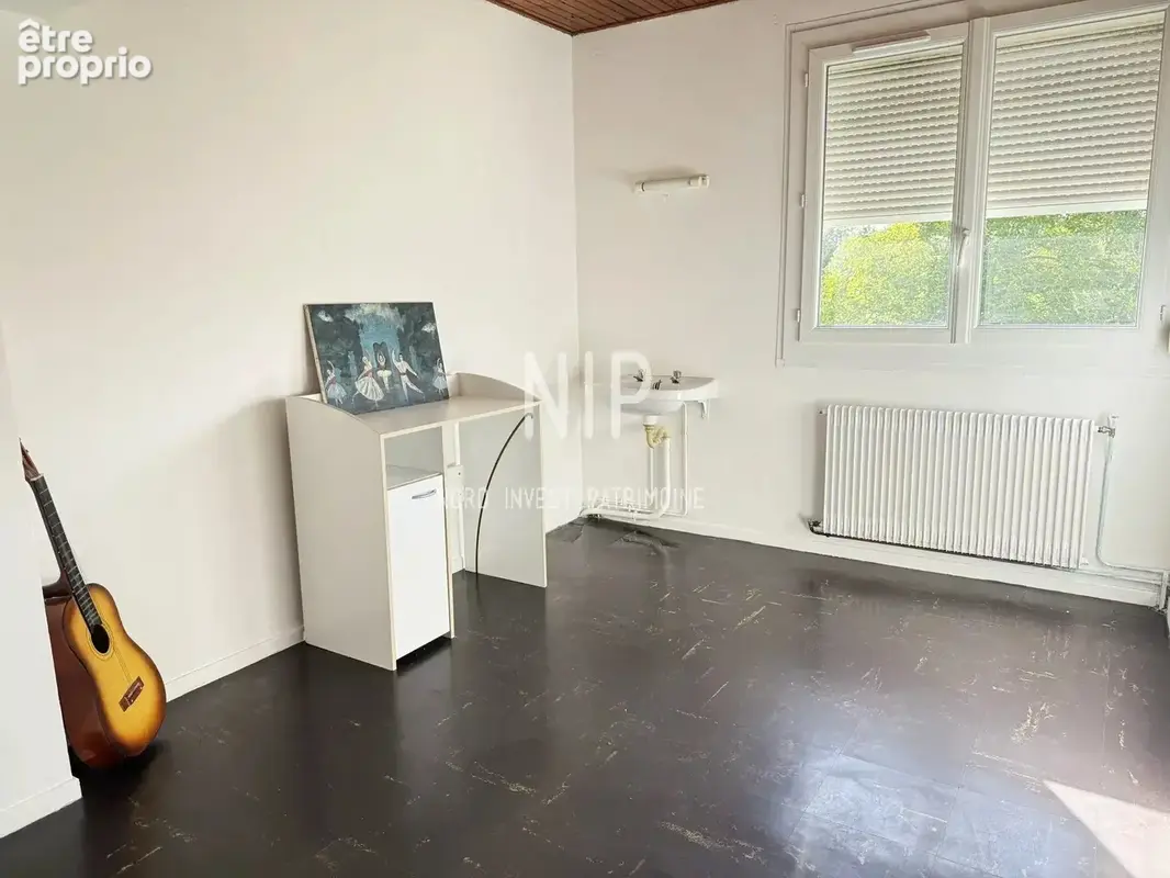 Maison des années 70 sur sous sol complet - photo 5