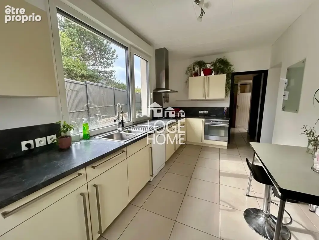 Maison 5 pièces 117 m² à vendre à Hem (59510) - photo 2