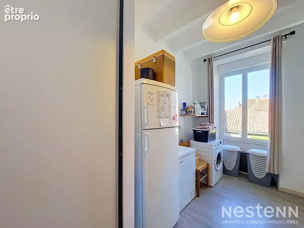 À vendre Maison de village en pierre de 216 m² avec deux appartements, cour, et garages - photo 16