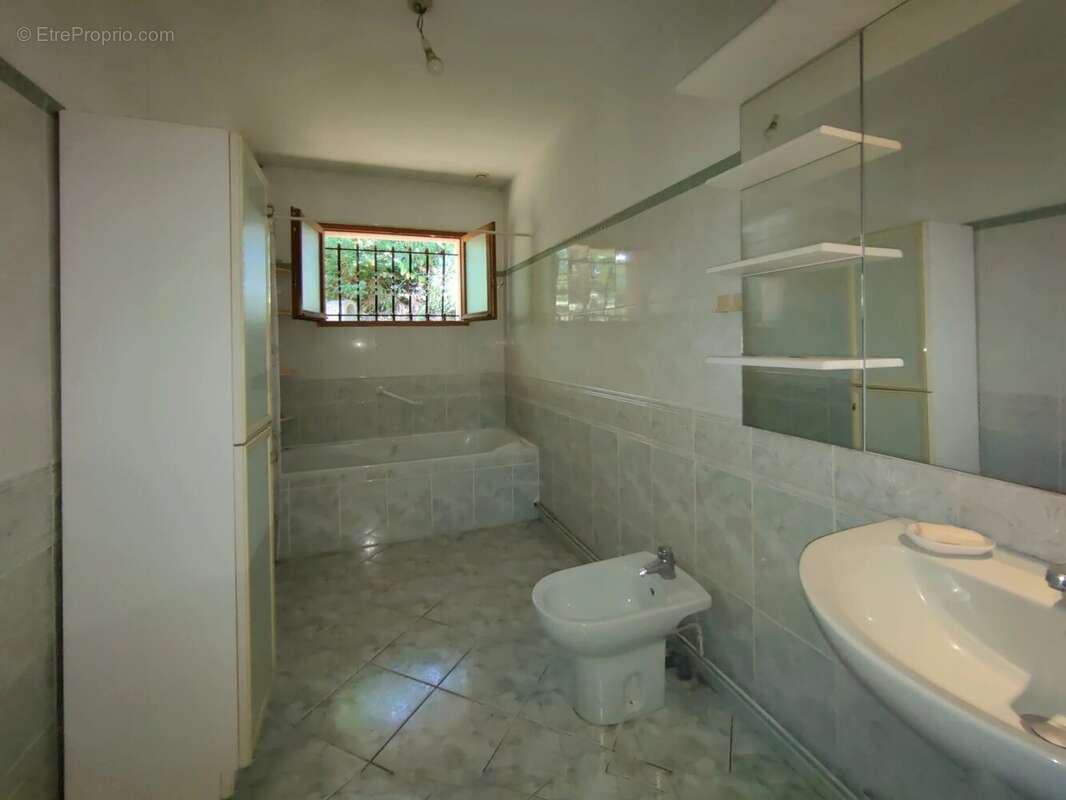 AYGUEMORTE LES GRAVES, Maison de 91 m² sur 832 m² - photo 13
