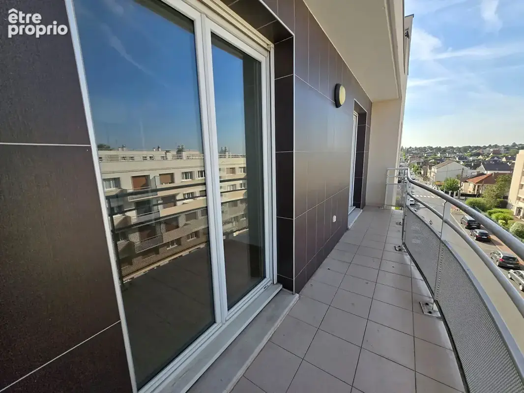 Appartement situé en plein centre ville - Balcon et places de stationnements - photo 4