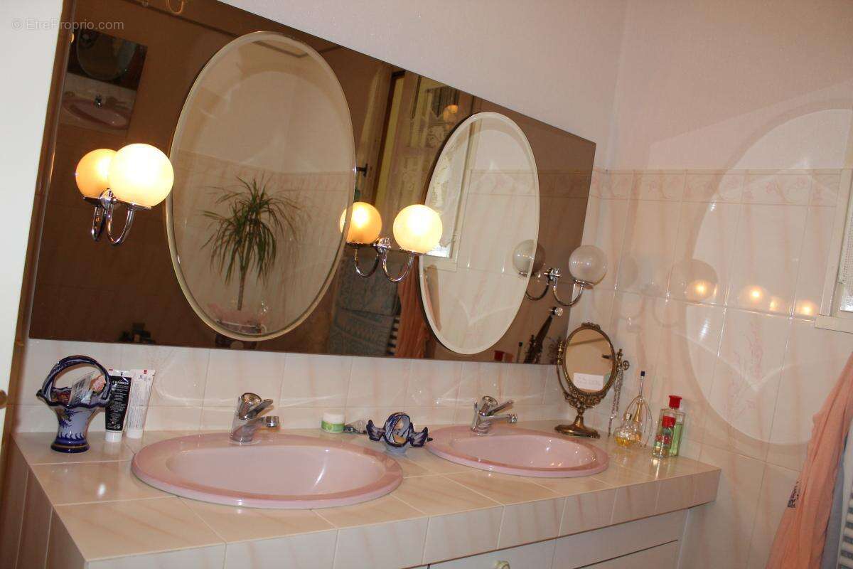 Maison sur deux niveaux avec sous sol - photo 6