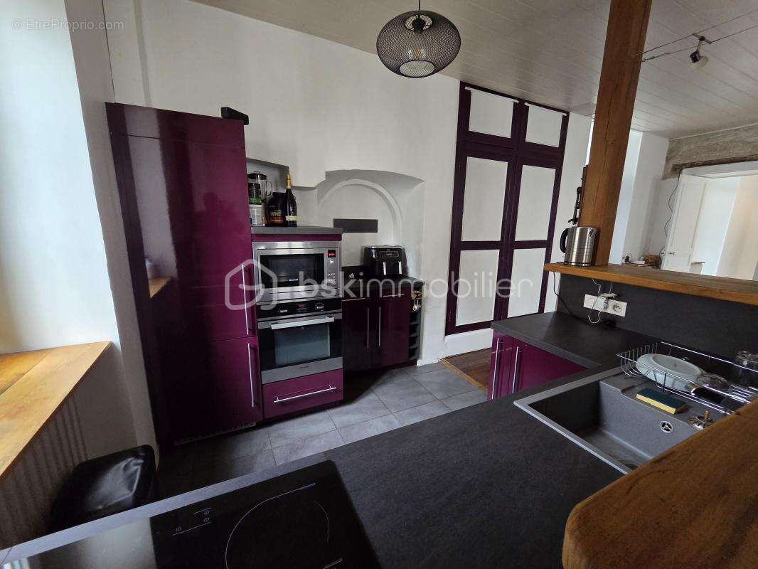 Magnifique appartement T3 de 101m² avec place de parking privative et cave en hypercentre ville de Nevers - photo 9