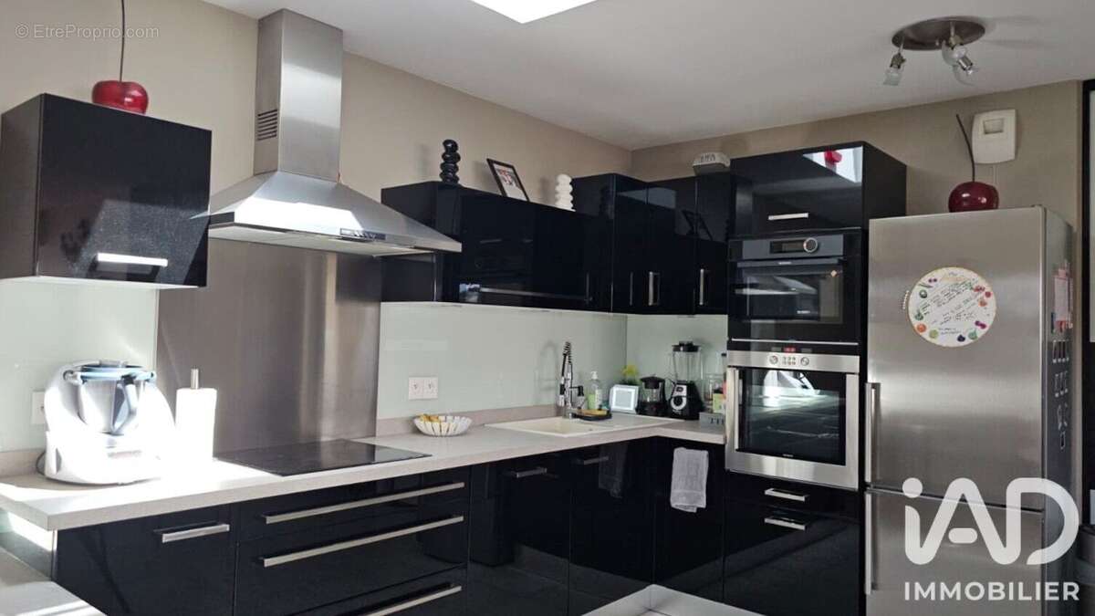 Photo 3 - Appartement à RILLIEUX-LA-PAPE