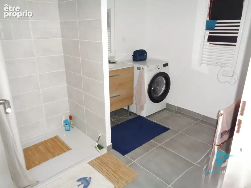Appartement en RDC - photo 6