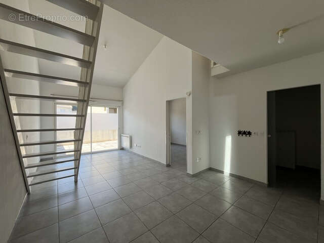 Appartement T3 avec terrasse et parking privatif - photo 2