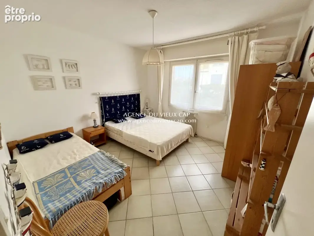 Achat cap d'agde secteur vieux port / falaises spacieux t3 en rdc vue jardin avec parking prive - photo 8