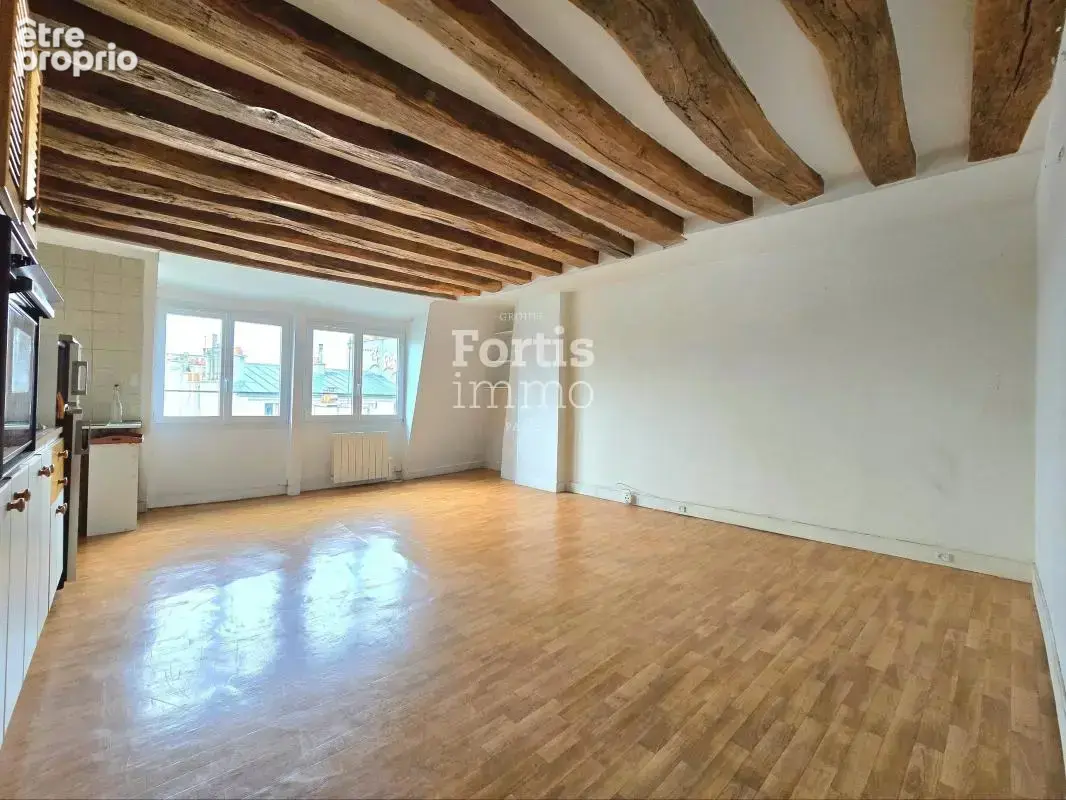 Paris 2 - duplex de 3 pieces, dernier etage avec vue degagee - photo 1