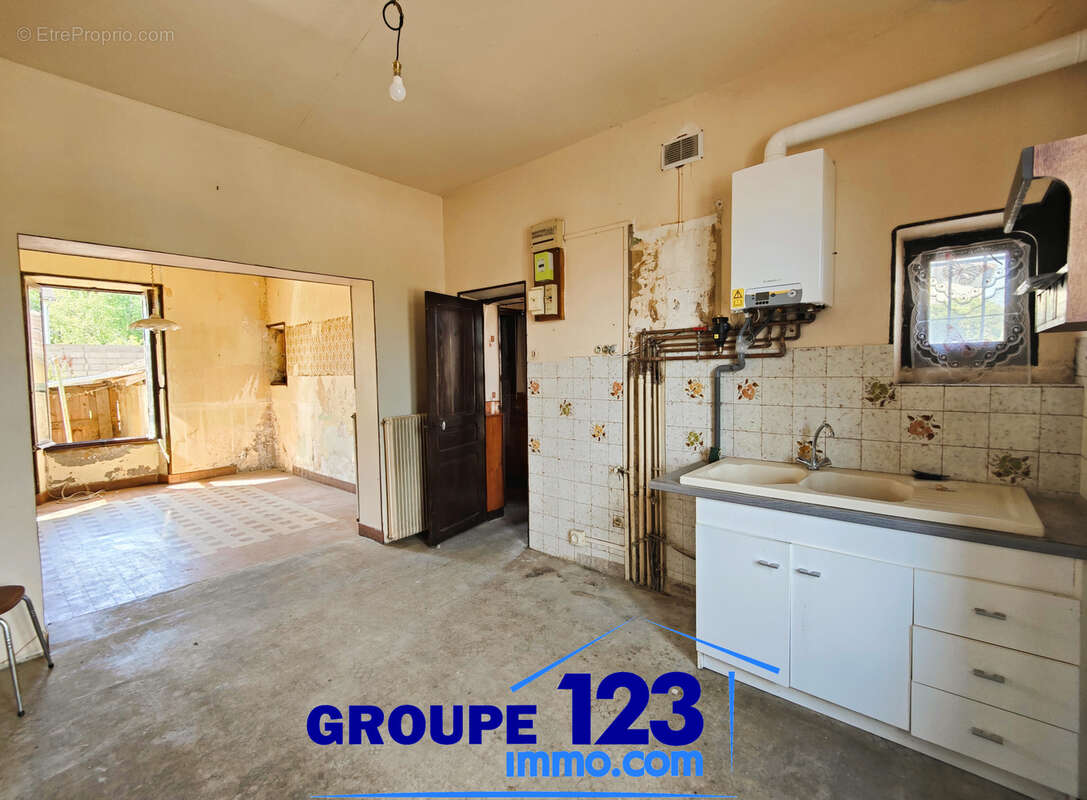 Une maison familiale aux beaux volumes, prête à écrire un nouveau chapitre - photo 3