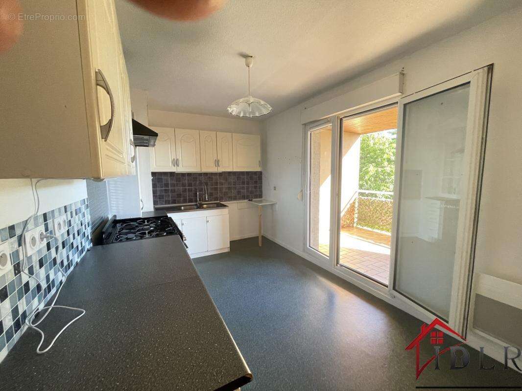 Appartement T4 avec terrasse couverte - photo 2