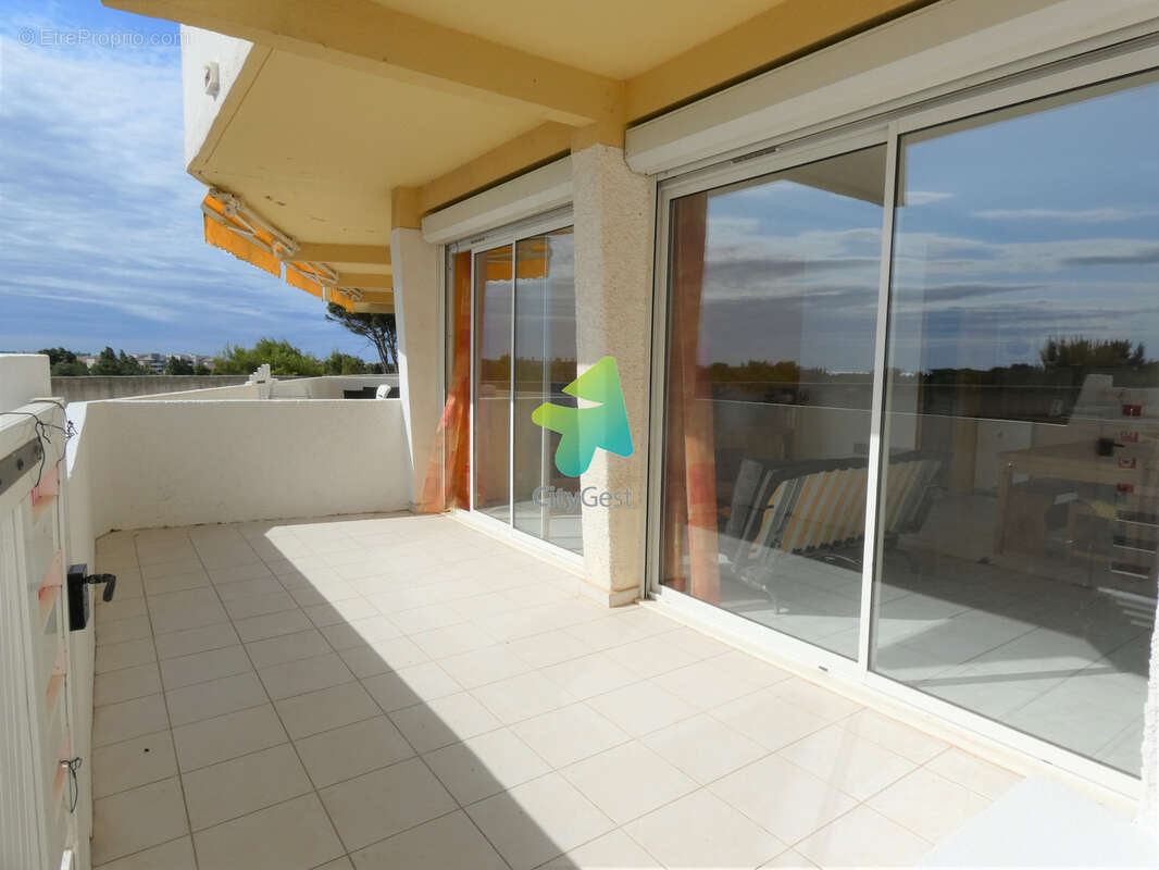 Appartement T3 69.57m2 + Terrasse + Cellier + Parkings - photo 12