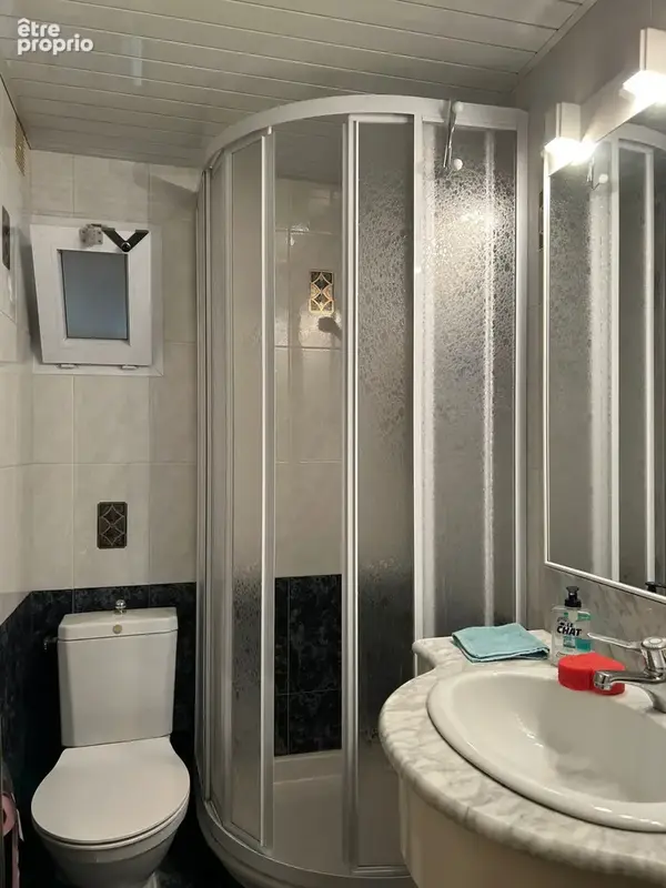 Immeuble avec commerce et 4 appartements - photo 11