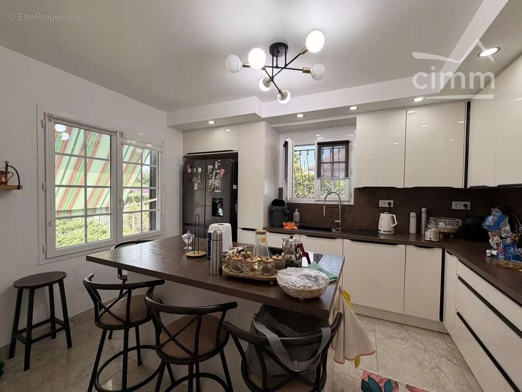 MER – Maison sur sous-sol complet de 130 m² – 4 chambres – Terrain de 970 m² avec vue dégagée sur les champs - photo 2