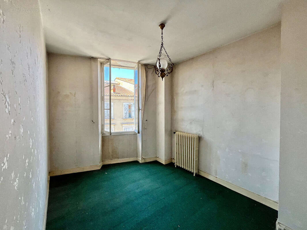 Villeneuve-sur-Lot, à quelques minutes à pied des commodités, un ensemble immobilier rare au coeur de la ville composé de 2 bâti - photo 13