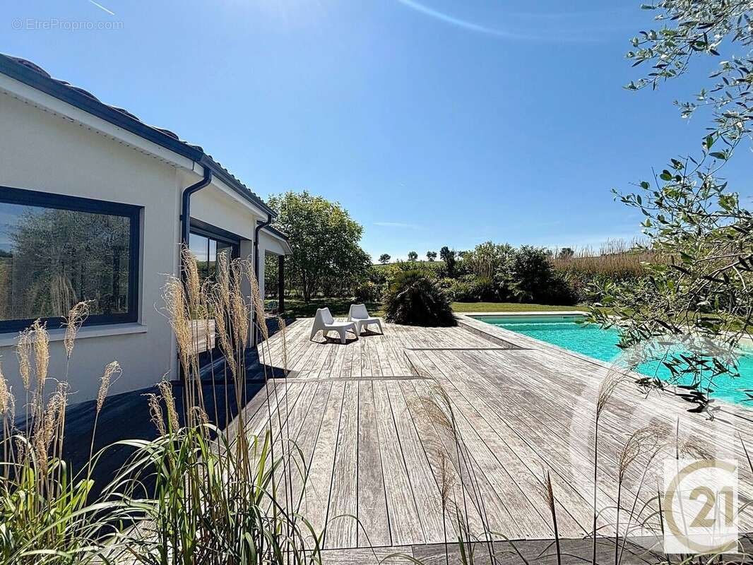 Maison à AYGUESVIVES