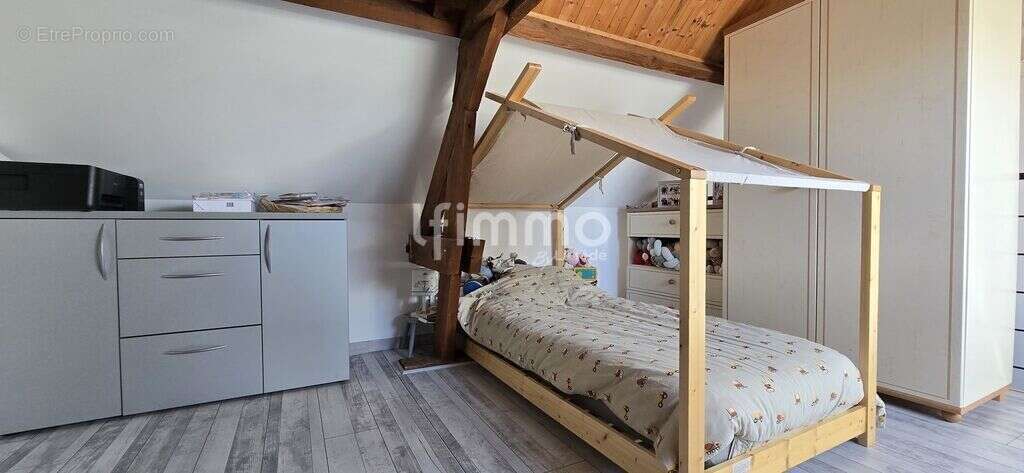 Maison avec jardin et garage – Une belle opportunité à saisir ! - photo 13