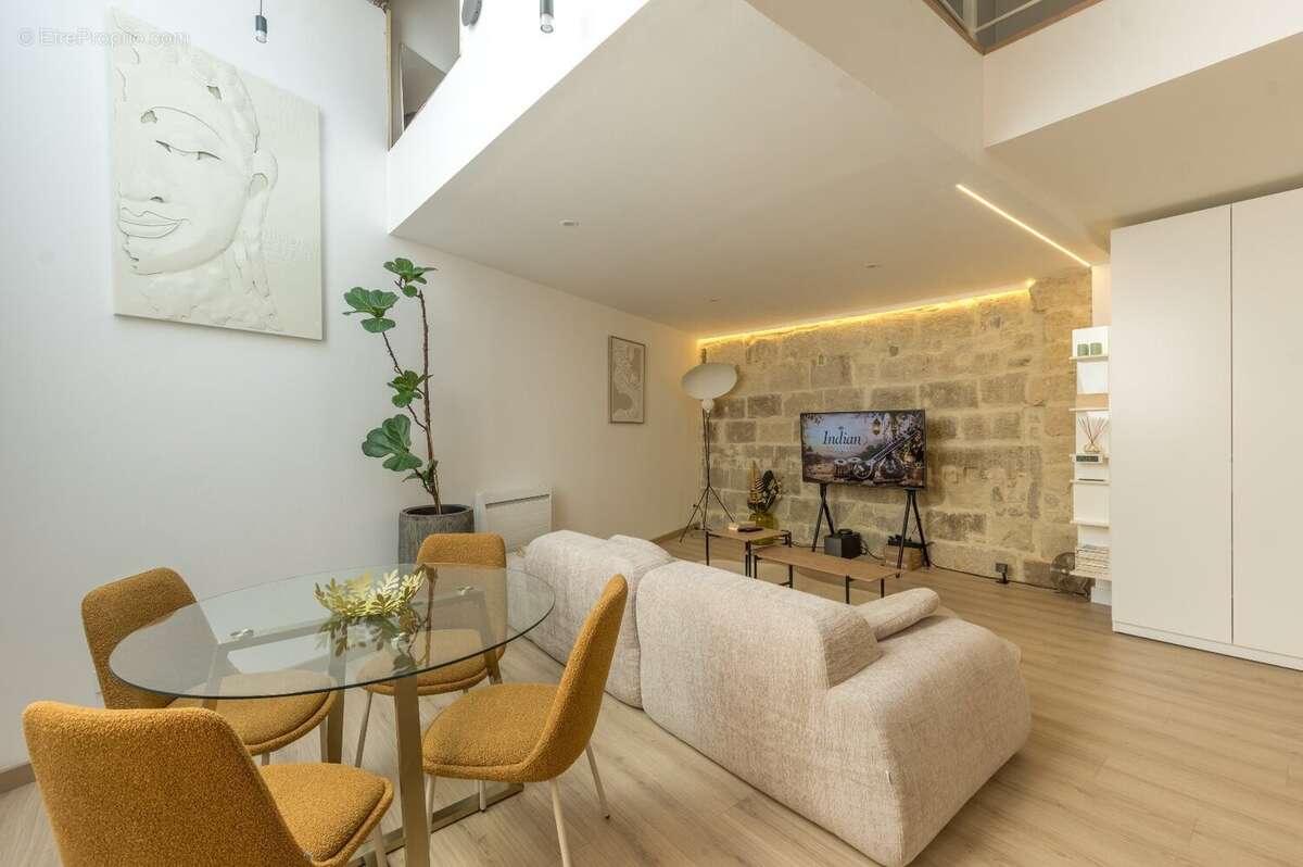 Appartement loft rénové avec mezzanine et belle hauteur sous plafond dans l'Écusson de Montpellier - photo 5