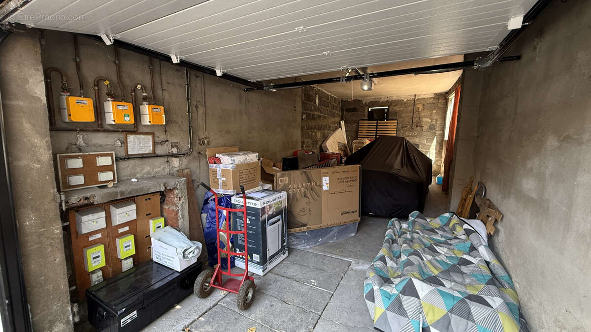 Investissement locatif à Vichy - Immeuble 3 appartements 4 garages - photo 23